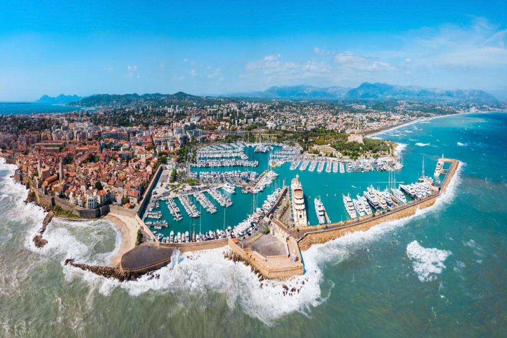 an aerial view of a resort on the beach at Cap et Soleil - Happy Rentals in Antibes