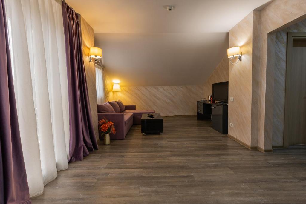Posezení v ubytování Hotel Corvaris