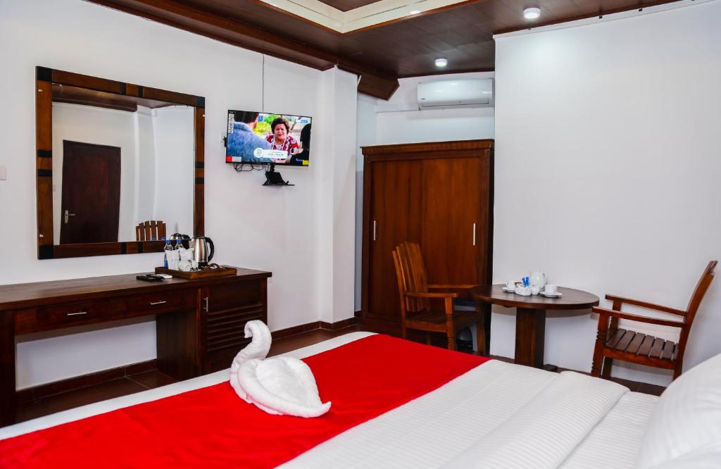 Postel nebo postele na pokoji v ubytování Hotel Sara