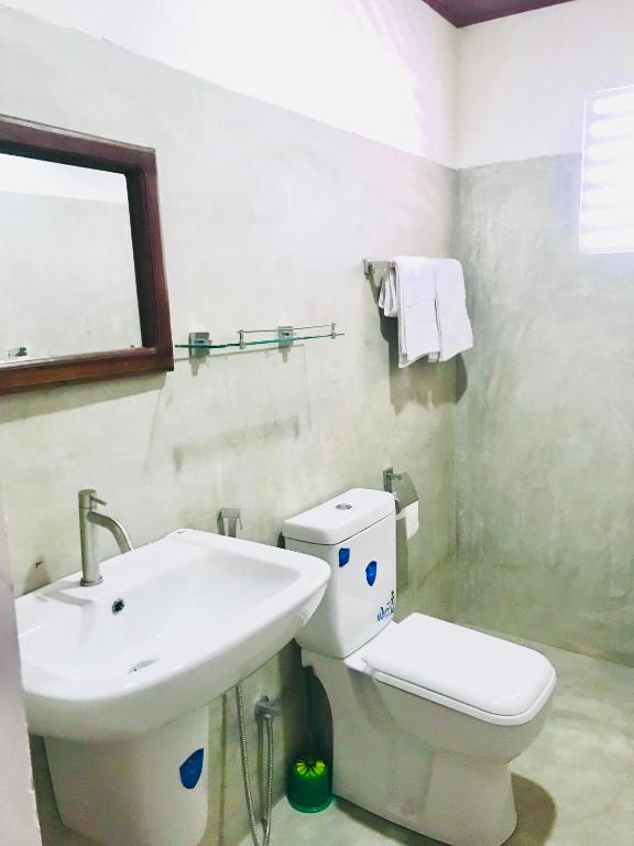 Koupelna v ubytování Hotel Remaco