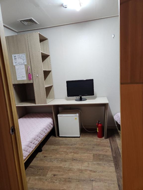 TV a/nebo společenská místnost v ubytování Halla Livingtel