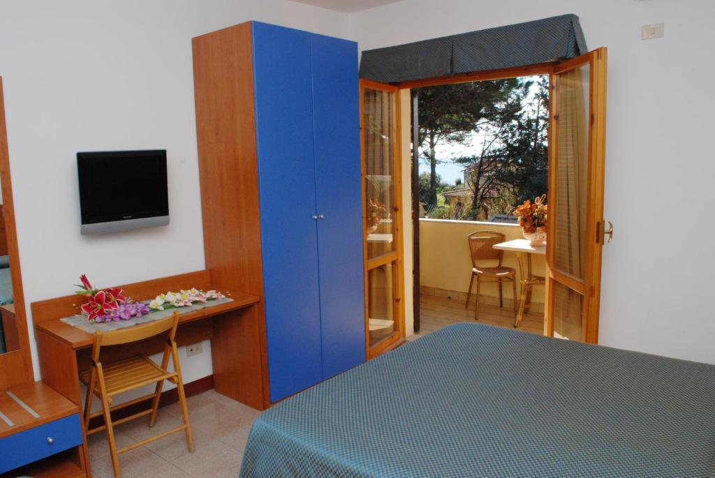 TV a/nebo společenská místnost v ubytování Hotel Da Fine