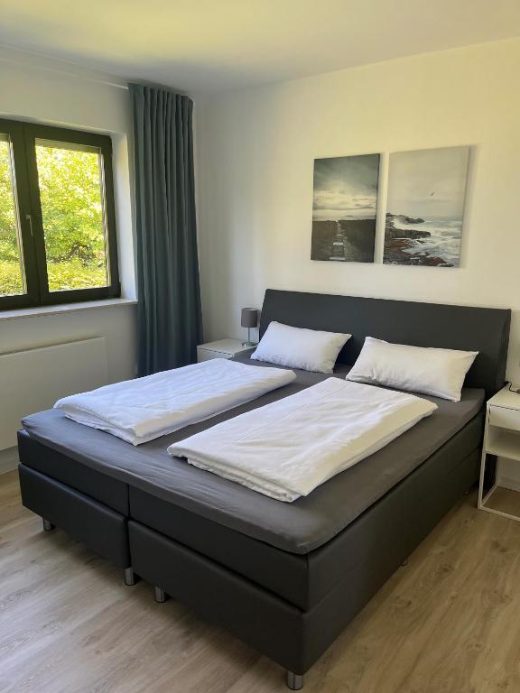 Postel nebo postele na pokoji v ubytování Troll's Brauhaushotel