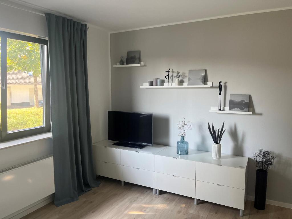 TV a/nebo společenská místnost v ubytování Troll's Brauhaushotel