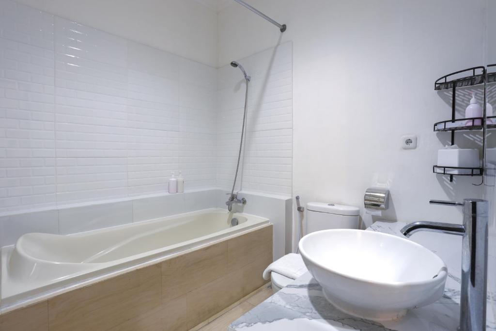 Koupelna v ubytování Jambuluwuk Residence Menteng