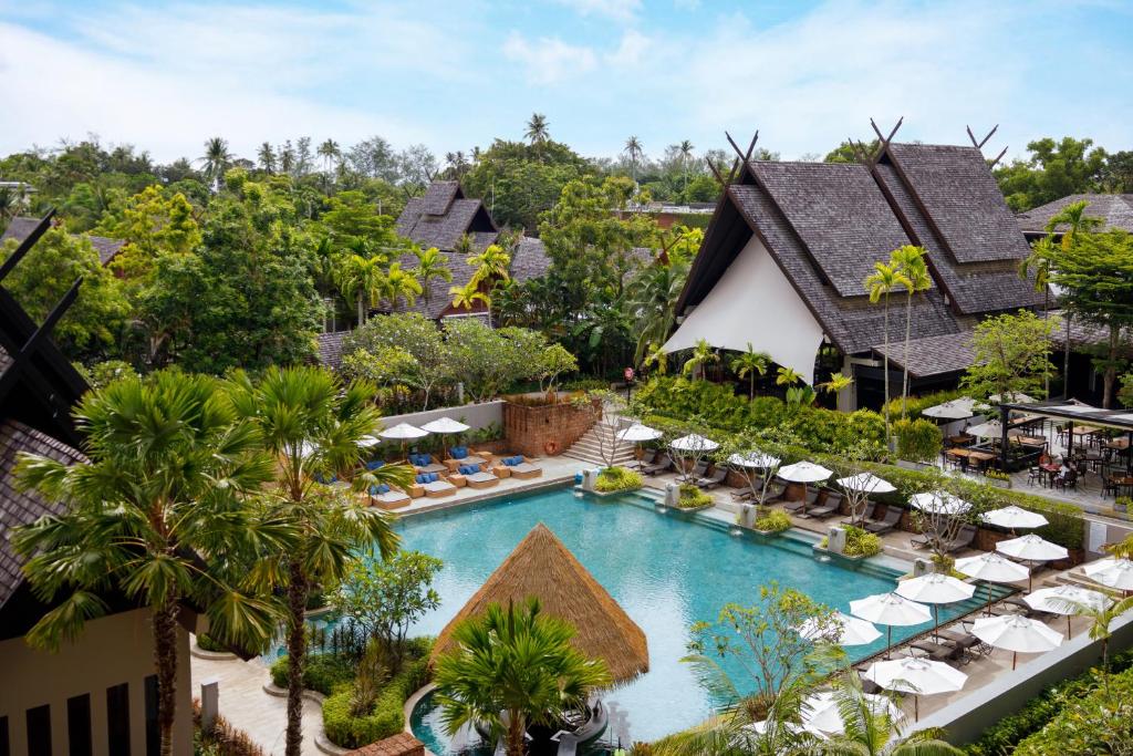 an aerial view of the resort with a swimming pool at Avani Plus Mai Khao Phuket Suites in Mai Khao Beach