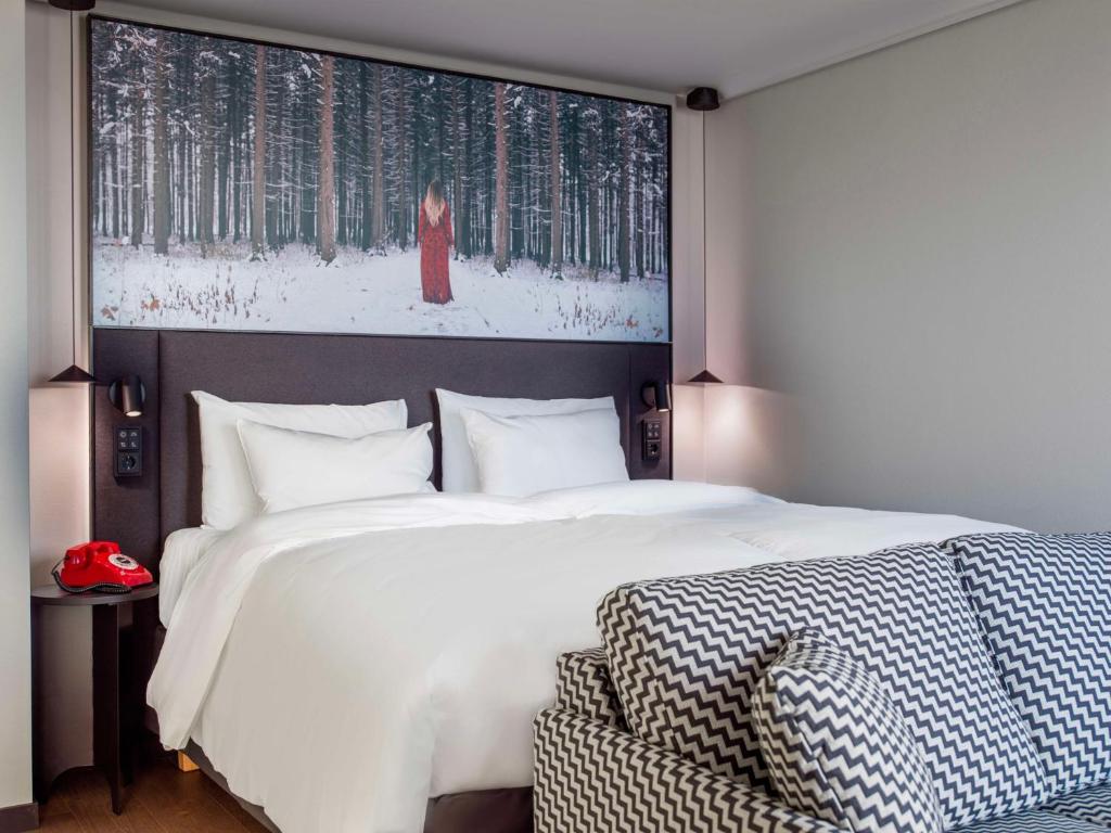 Ένα ή περισσότερα κρεβάτια σε δωμάτιο στο Radisson RED Helsinki