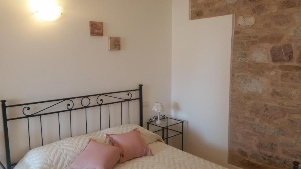 Postel nebo postele na pokoji v ubytování B&B Le Rose