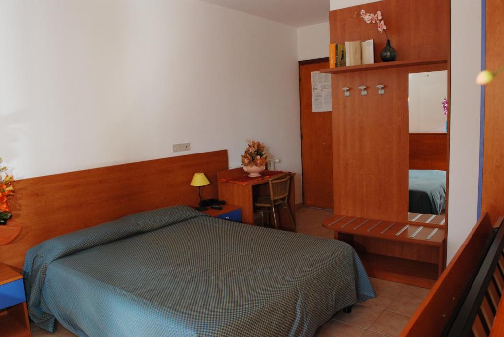 Postel nebo postele na pokoji v ubytování Hotel Da Fine