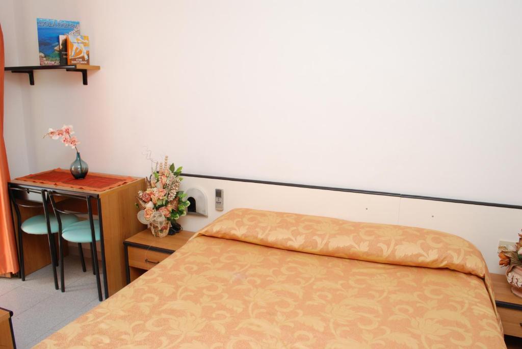 Postel nebo postele na pokoji v ubytování Hotel Da Fine