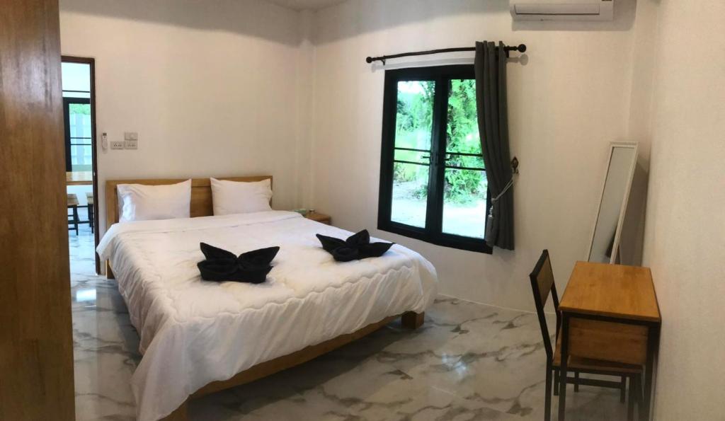 Katil atau katil-katil dalam bilik di Villa Cattleya