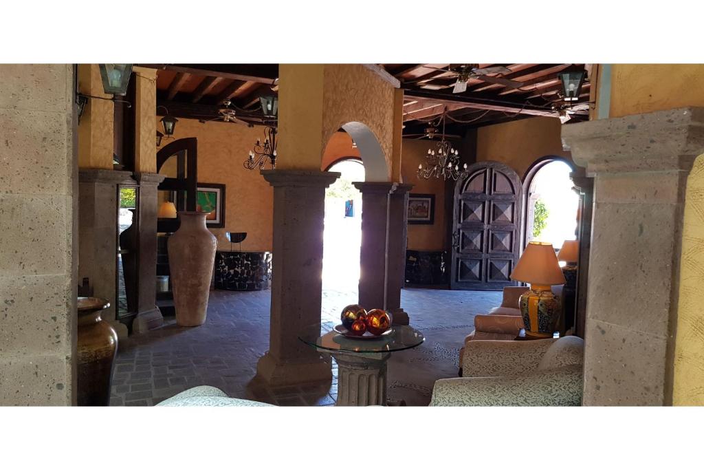 Posezení v ubytování Hotel Boutique Posada De Las Flores Loreto