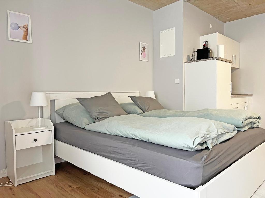 Ένα ή περισσότερα κρεβάτια σε δωμάτιο στο Air Apartments 15