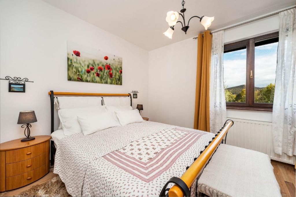 Posteľ alebo postele v izbe v ubytovaní B&B Villa Sumrak Plitvica