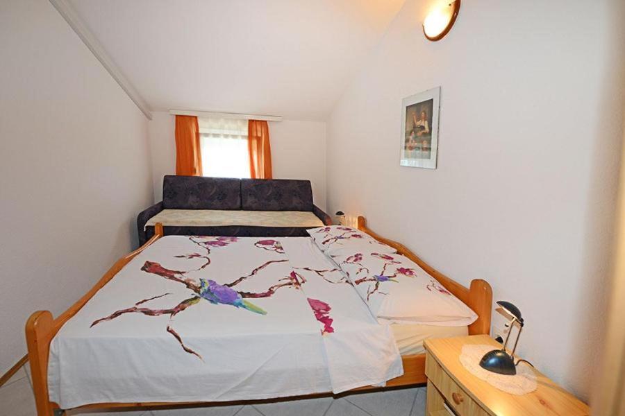 Postel nebo postele na pokoji v ubytování Vila Matkovic