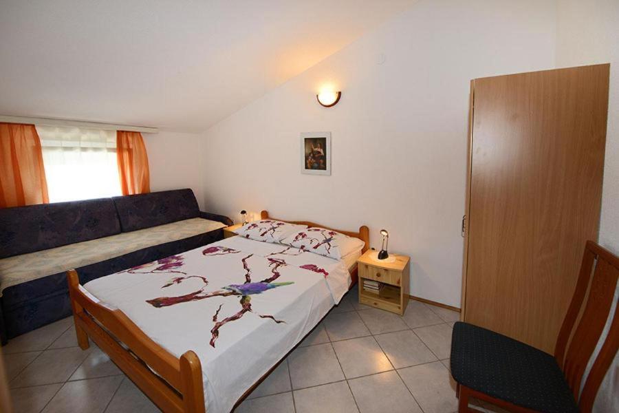Postel nebo postele na pokoji v ubytování Vila Matkovic