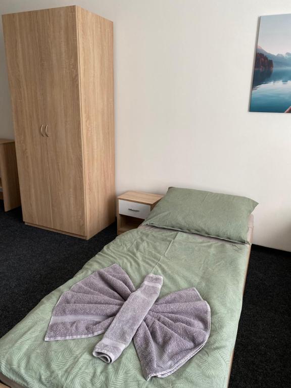 Postel nebo postele na pokoji v ubytování Apartmány Plzeň Zborovská 22 a