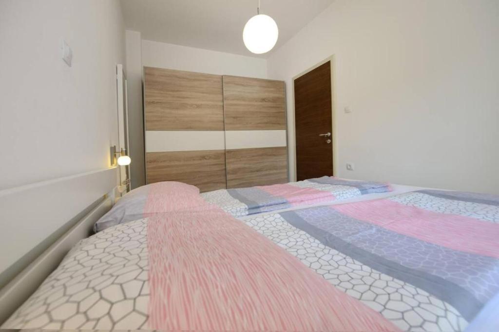 Postel nebo postele na pokoji v ubytování Vila Matkovic