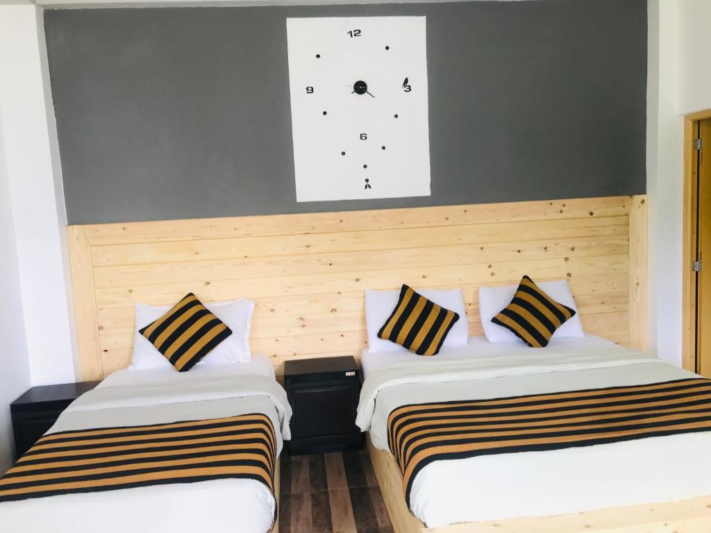 Postel nebo postele na pokoji v ubytování Rawana View Ella