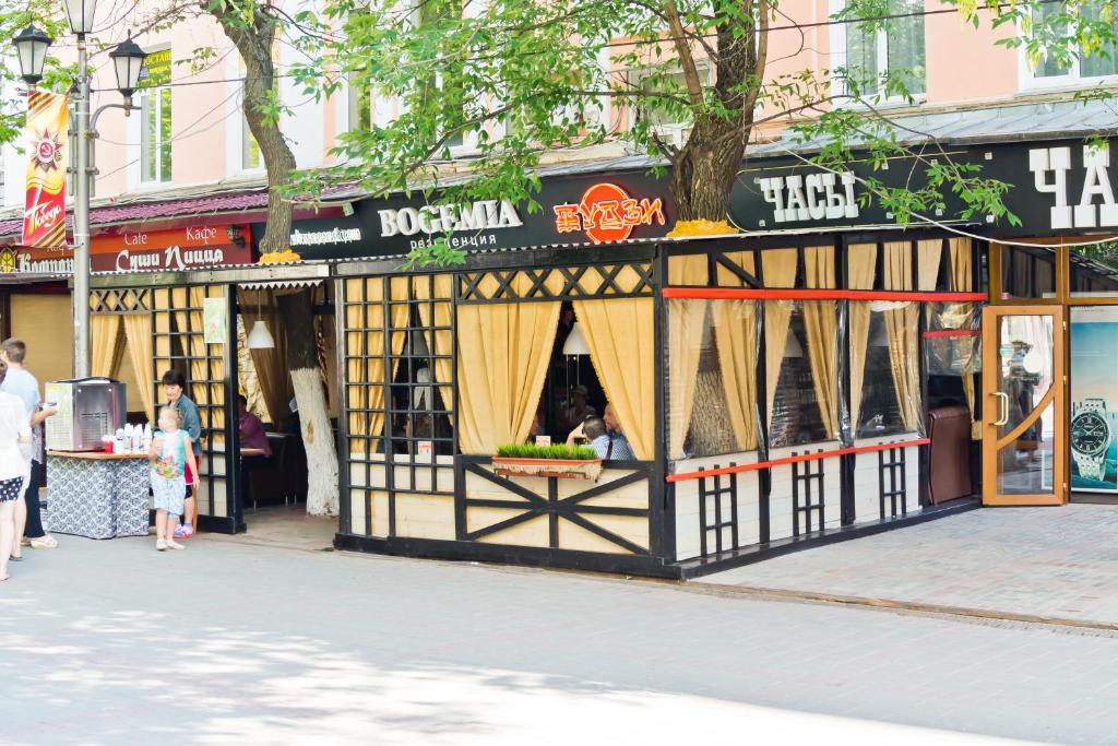 a store on the side of a street at Bogemia Private Residence in Saratov