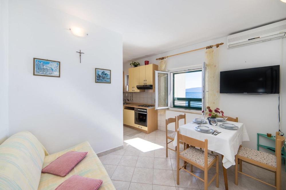 Kuchyň nebo kuchyňský kout v ubytování Apartments Dominko