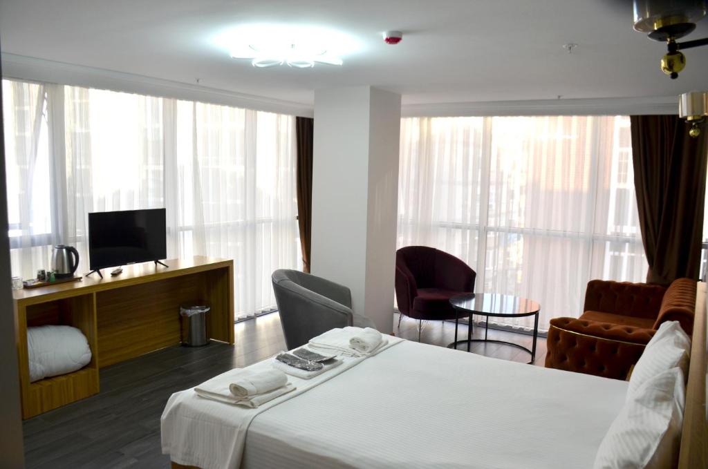 TV a/nebo společenská místnost v ubytování Waves hotel