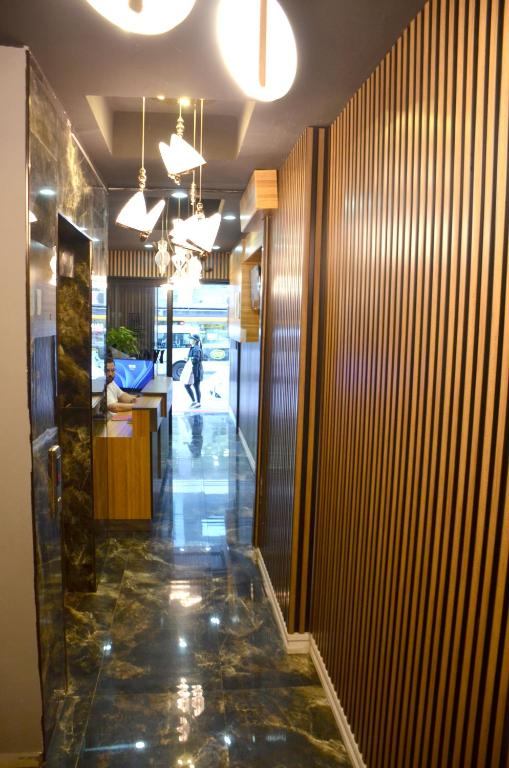 Kuchyň nebo kuchyňský kout v ubytování Waves hotel