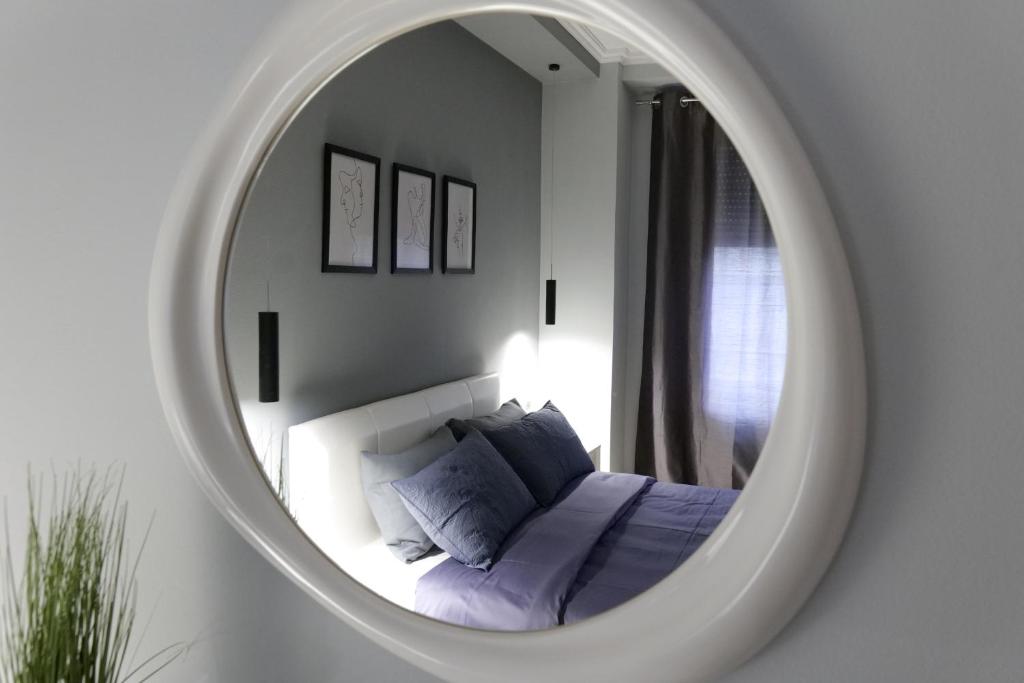 Ένα ή περισσότερα κρεβάτια σε δωμάτιο στο Luxury condo in Tirana