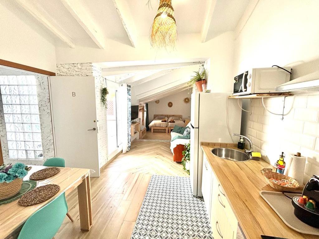 Kuchyň nebo kuchyňský kout v ubytování Loft B El Ramellet