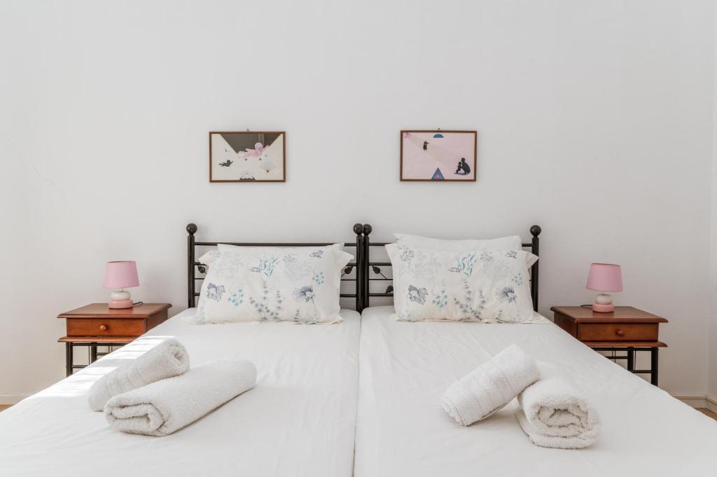 Łóżko lub łóżka w pokoju w obiekcie Margaret House