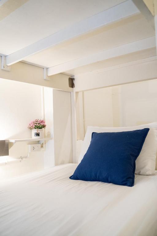 Postel nebo postele na pokoji v ubytování Qilombo Hostel Silom - HQ