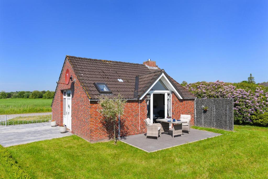 Κήπος έξω από το Ferienhaus Nordseekate