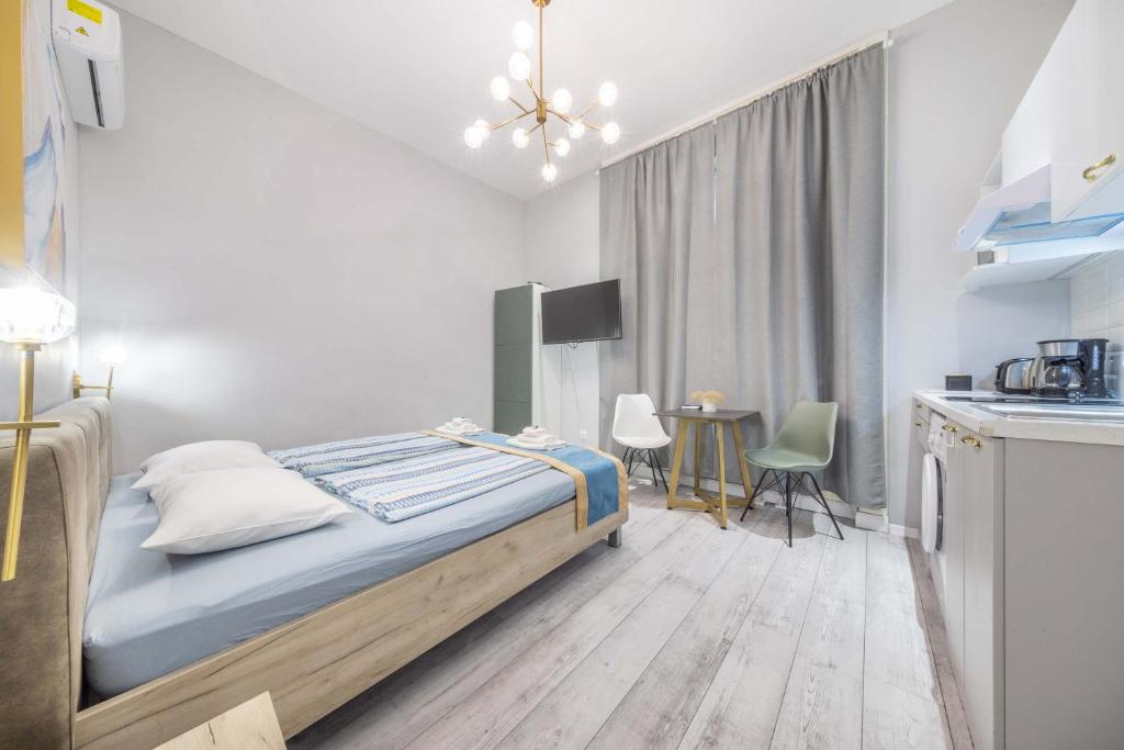 Posteľ alebo postele v izbe v ubytovaní JS Modern Downtown Studios-Self Check-in