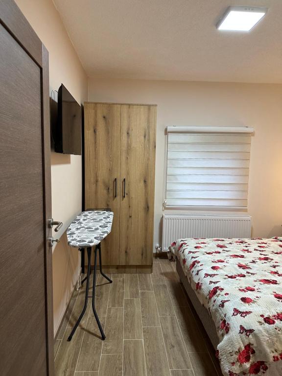 Postel nebo postele na pokoji v ubytování Apartman Pogled Arilje