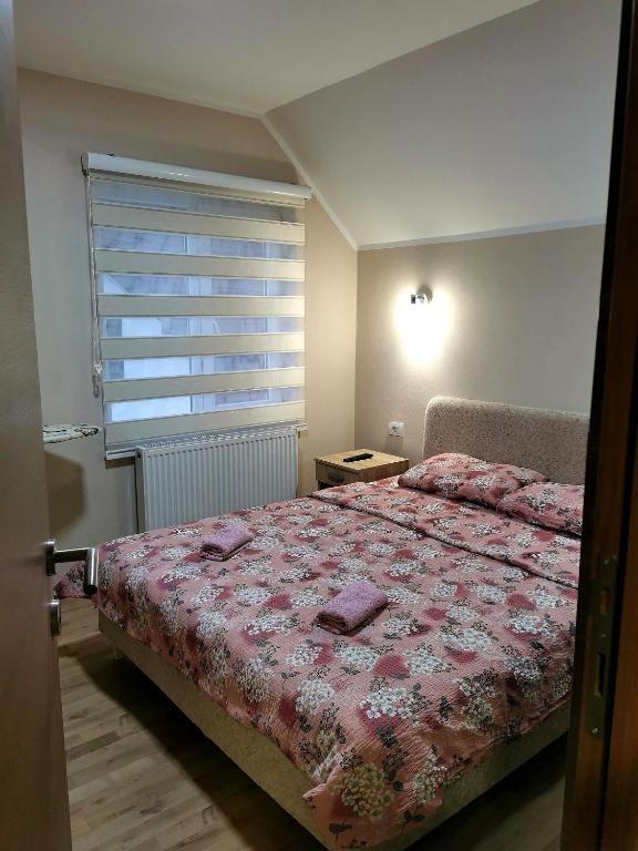 Postel nebo postele na pokoji v ubytování Apartman Pogled Arilje