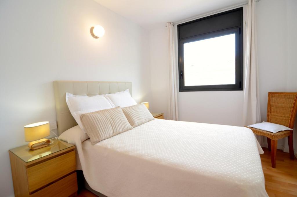 Postel nebo postele na pokoji v ubytování ESGLESIA 7 - Apartamento duplex