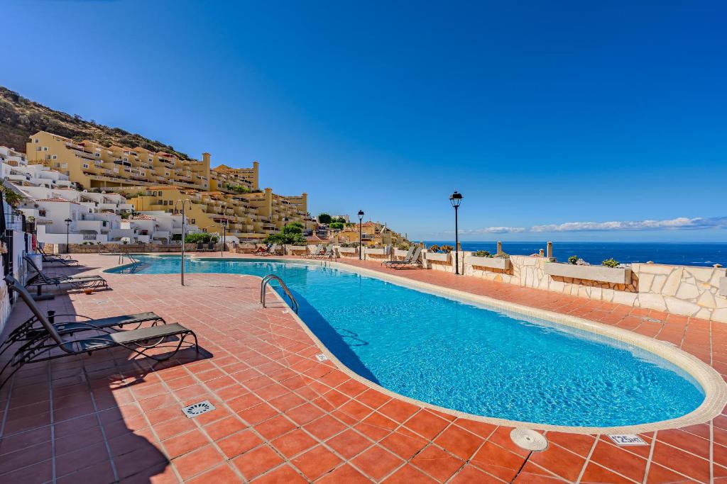 Swimmingpoolen hos eller tæt på Apartment in Balcon del Atlantico