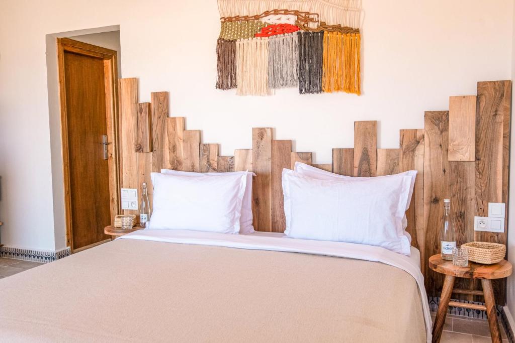 Una cama o camas en una habitación de Dakhla Attitude