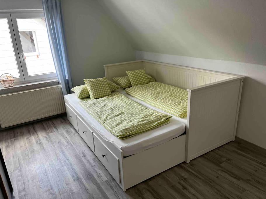 Postel nebo postele na pokoji v ubytování Franzis Landhaus