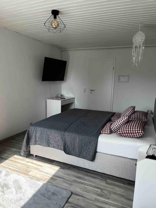 Postel nebo postele na pokoji v ubytování Franzis Landhaus
