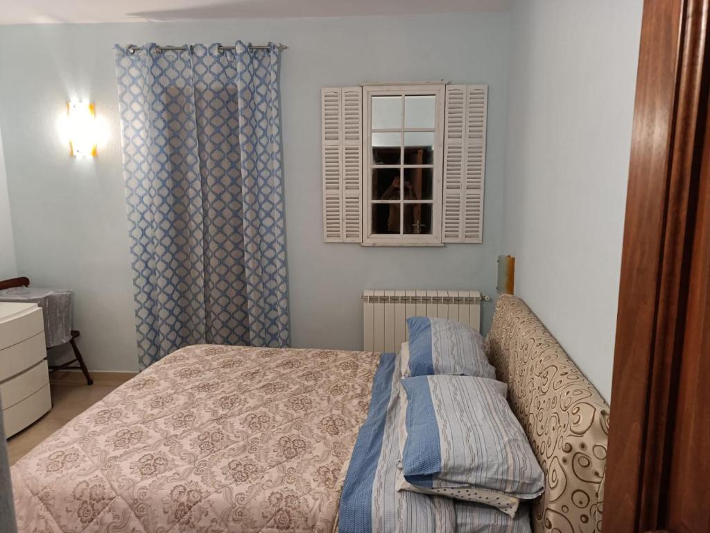 Letto o letti in una camera di Suite Giulia