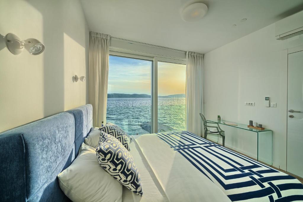 Posteľ alebo postele v izbe v ubytovaní Livingstone Beach House
