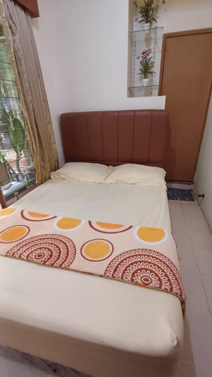 Voodi või voodid majutusasutuse GIO Guesthouse Bogor toas