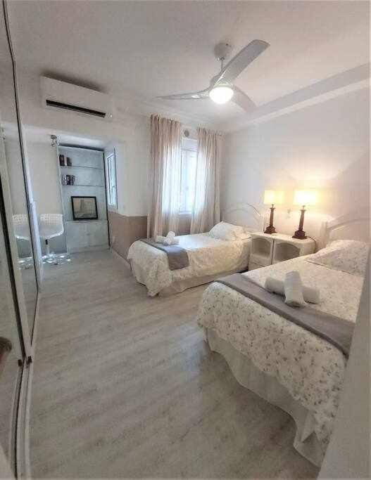 A bed or beds in a room at BREEZE VIEW house by the sea