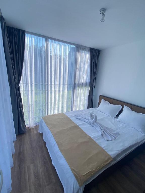 Postel nebo postele na pokoji v ubytování Valea Regilor Happy Camp