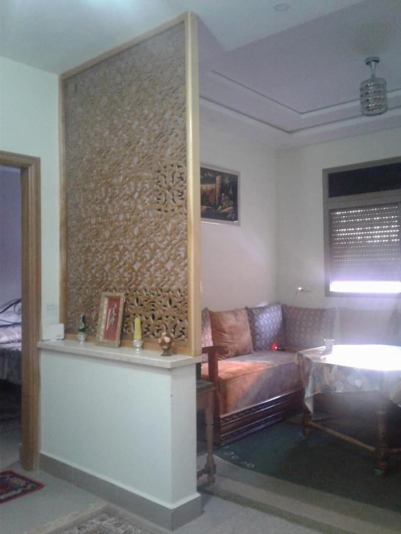Postel nebo postele na pokoji v ubytování Appartement meublé ennasr49