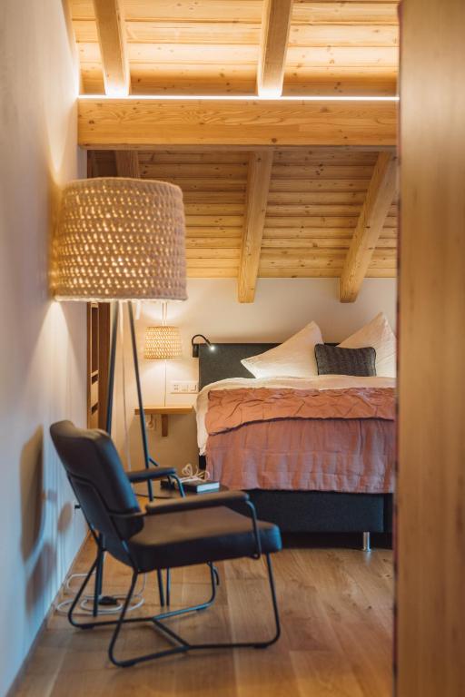 Postel nebo postele na pokoji v ubytování Hotel Walliserkanne