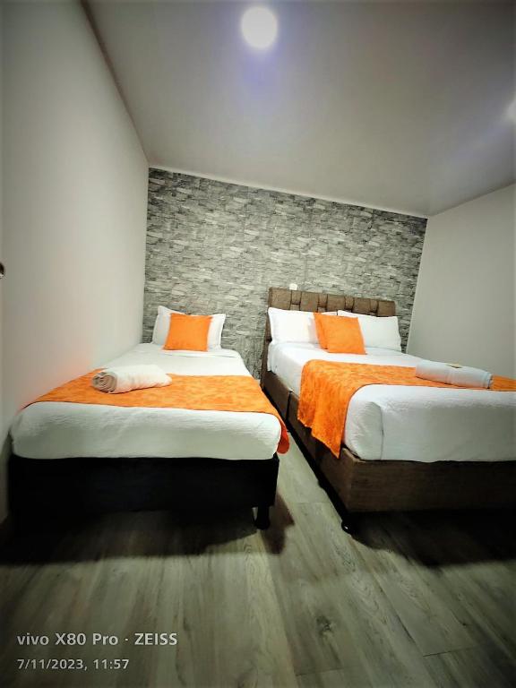 Postel nebo postele na pokoji v ubytování Hotel Kristal Ferial