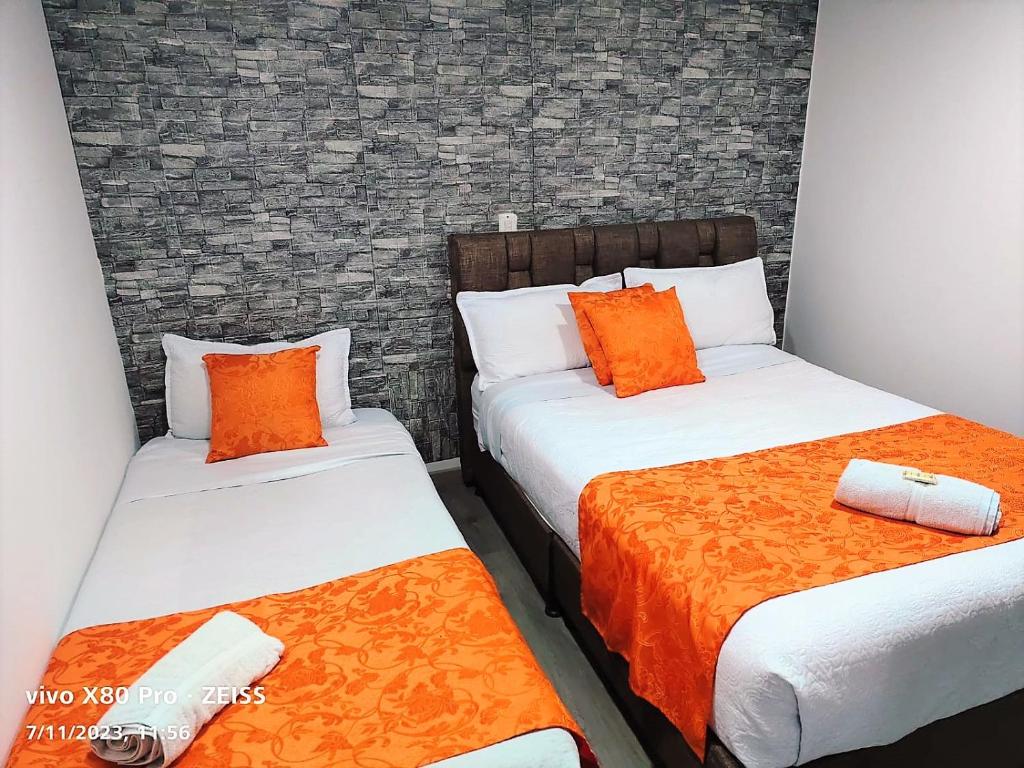Postel nebo postele na pokoji v ubytování Hotel Kristal Ferial