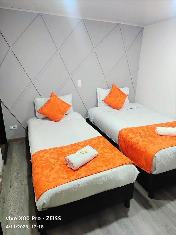 Postel nebo postele na pokoji v ubytování Hotel Kristal Ferial